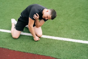 An athlete in pain due to a shoulder injury