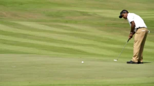 A man golfing after recovering from shoulder replacement